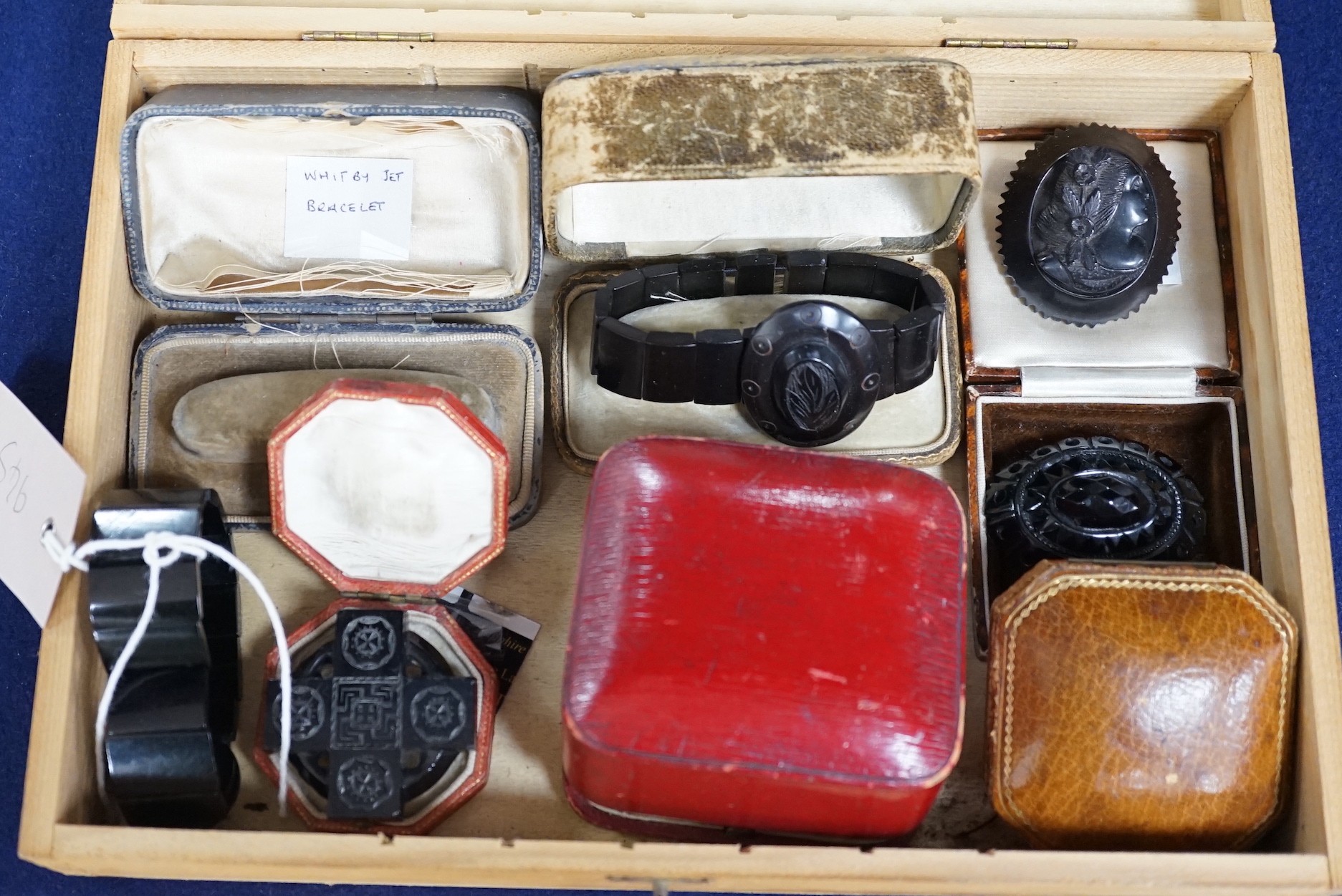 A group of assorted Whitby jet jewellery including three brooches, largest approximately 47mm, three bracelets and a group of French jet? loose pieces.